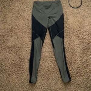 Green and black color-block leggings